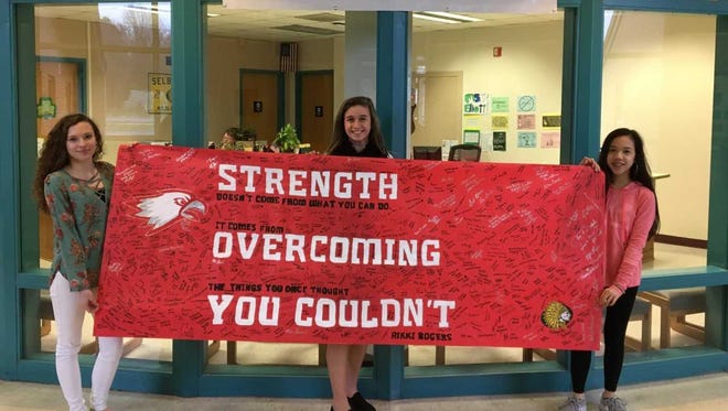 The banner created by Selbyivlle Middle School students to be sent to Marjory Douglas High School in Florida.