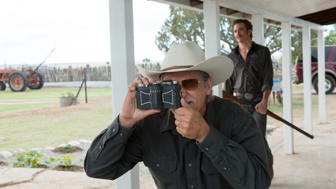 Jeff Bridges shoots with his Widelux camera (co-star Chris Pine is standing behind him) on the set of 'Hell or High Water.'