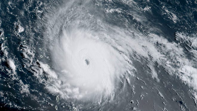 This image obtained from the National Oceanic and Atmospheric Administration shows Hurricane Irma on September 5, 2017, at 1215UTC.
Irma picked up strength and has become an "extremely dangerous" Category Five hurricane as it approached the Caribbean, the Miami-based National Hurricane Center reported. Irma is about 270 miles (440kms) east of the island of Antigua packing maximum sustained winds of 175mph (280kph).
 / AFP PHOTO / NOAA/RAMMB / Jose ROMERO / RESTRICTED TO EDITORIAL USE - MANDATORY CREDIT "AFP PHOTO / NOAA/RAMMB" - NO MARKETING NO ADVERTISING CAMPAIGNS - DISTRIBUTED AS A SERVICE TO CLIENTS

JOSE ROMERO/AFP/Getty Images ORIG FILE ID: AFP_S494A