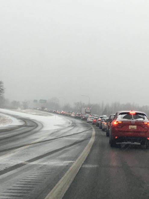 Traffic crawls on I-495 Friday afternoon.