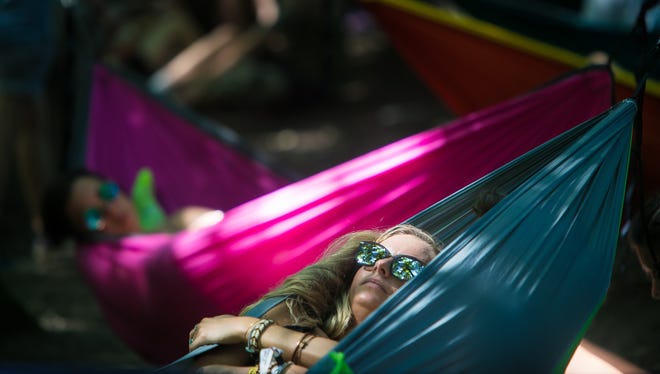 Fans rest at The Nook area on the final day of 2018 Firefly Music Festival at The Woodlands in Dover.