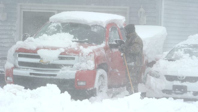 2/6/10 MILFORD, DE -  SNOW.STORM - Snow storm in lower Kent County Saturday Feb. 6, 2010. A Milford resident trying to unbury his truck.   The News Journal/GARY EMEIGH