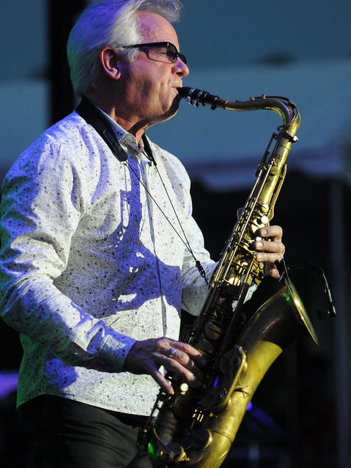 Johnny Colla, on the saxophone with Huey Lewis and the News, who performed on Wednesday at the Freeman Stage.