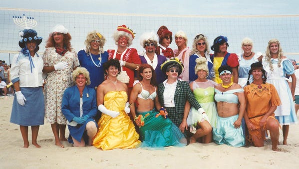 A group shot at one of the previous drag volleyball matches.