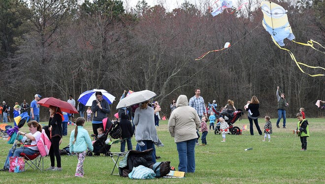 Despite cloudy and rainy weather, the 48th Annual Kite Festival was held on Friday March 25th at Cape Henlopen State Park near Lewes with a good crowd on hand flying all kinds of kites and creations.