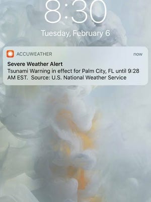 A tsunami warning was mistakenly sent to smartphones and tweeted Tuesday morning to many residents along the East Coast.
