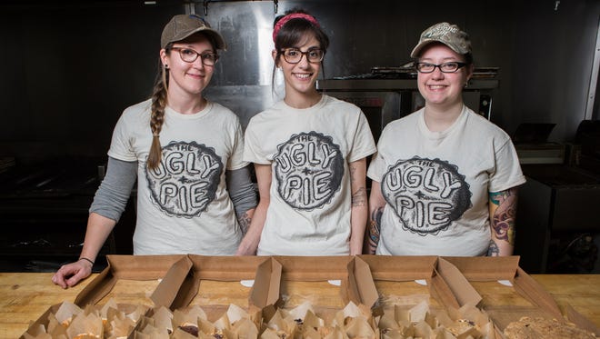 From left, the Ugly Pie co-owners, Heather Hall, of Salisbury, Bridget Perry, of Princess Anne and Shaina Bounds, of Salisbury pose for a photo at the Black Diamond Lodge in Fruitland on Wednesday, Jan. 25, 2017.