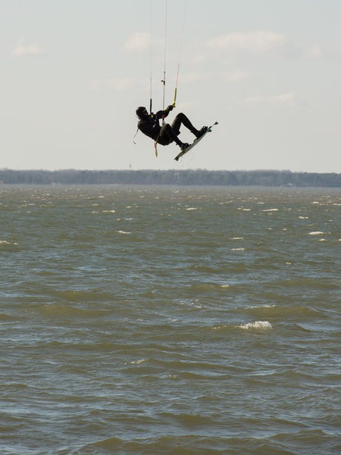 Jess Dodd of Bethany Beach enjoys a afternoon of kiteboarding in the Rehoboth Bay south of Dewey Beach.