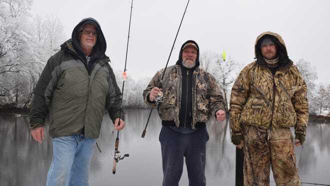 Frank Costanzo of Milton, Curtis Freberg of Long Neck, and Aaron Strausbaugh of Milton enjoyed their Saturday morning fishing ritual in the snow.