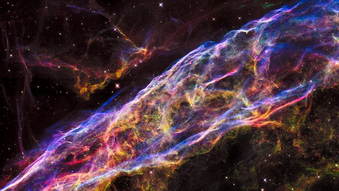 NASA's Hubble Space Telescope has unveiled in stunning detail a small section of the Veil Nebula - expanding remains of a massive star that exploded about 8,000 years ago.
