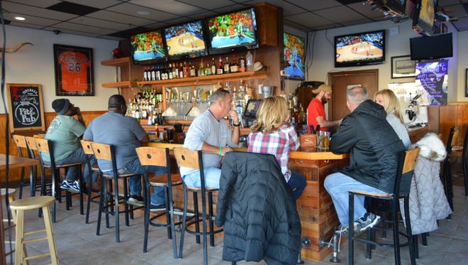 Patrons relax at the new Pit & Pub location on 127th Street in Ocean City.