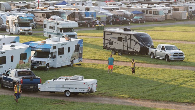 RV's lined up to park at their campsite Campers at the Firefly Music Festival in Dover.