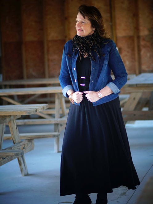 Virginia Griffith, of Lewes, models some of her favorite fashions at Conley's Chapel.