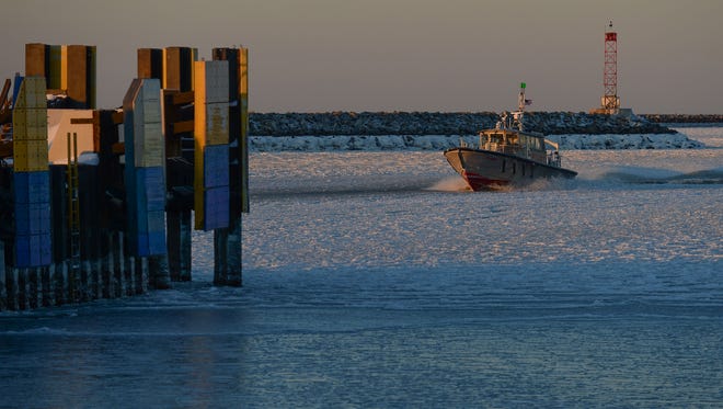 A pilot boat cruises through the Delaware Bay keeping the channel open for the Cape May-Lewes Ferry on Friday, Jan. 5, 2018.