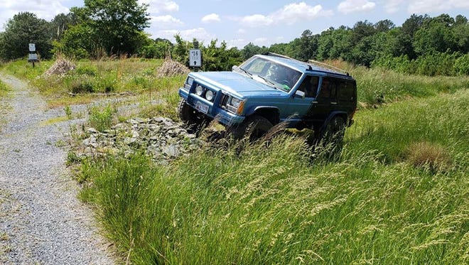 A jeep goes through the course at the Deer Run Jeep Golf course, opening June 2.