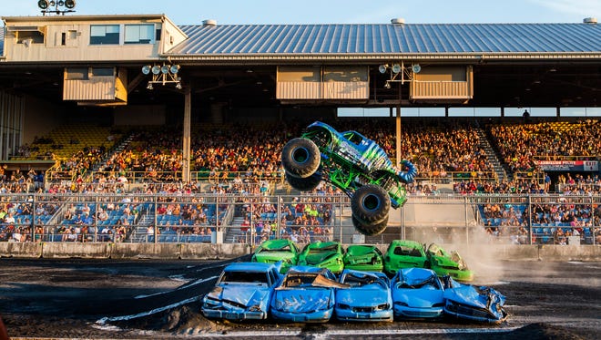 The Stinger flies through the air during the Monster Truck Meltdown show at the Delaware State Fair in Harrington on Thursday evening.
