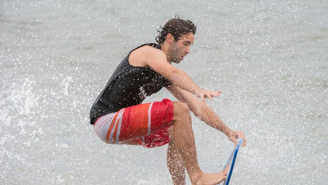 Nick Yorkley of Minneapolis, Minn., competes in the semi pro division at the Zap Pro/Amateur World Championships of Skimboarding at Dewey Beach.