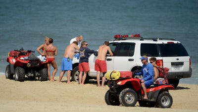 This 2015 Daily Times file photo shows surf rescue technicians performing an exercise on the beach in Ocean City. On Friday, July 28, rescuers pulled a beachgoer from the ocean after the person suffered a suspected medical episode.