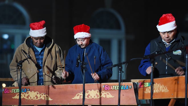 A group of musicians performs at Georgetown's Annual Caroling on the Circle.