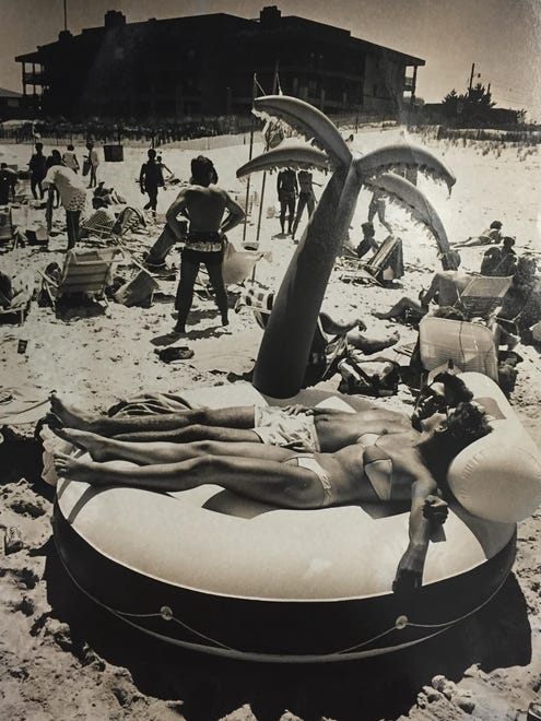 We can't tell what's more '80s: Greg Doll and Julie Sutton's outfits or their inflatable oasis on Dewey Beach in 1986.
