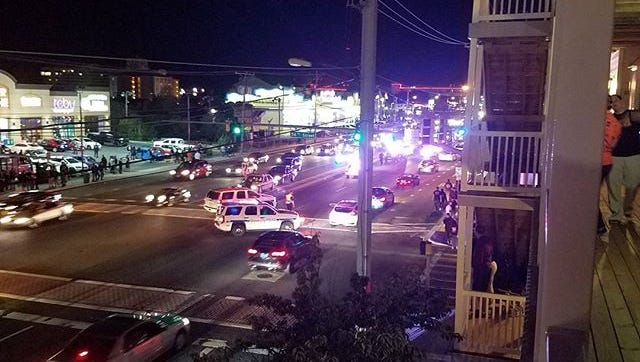 A pedestrian in his mid-20s was struck by an Ocean City Police officer at the intersection 56th Street and Coastal Highway late Friday night, officials say.