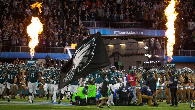 The Philadelphia Eagles take the field at the start of Super Bowl LII.