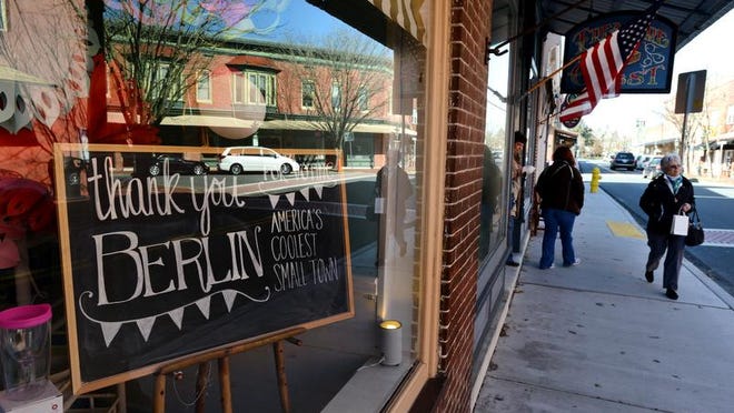 A sign in the window of TaDa along Main Street in Berlin thanks people for voting for Berlin as America's Coolest Small Town. <137,2014/03/14,Griffin/c Chrishelle1>Friday afternoon. <137>