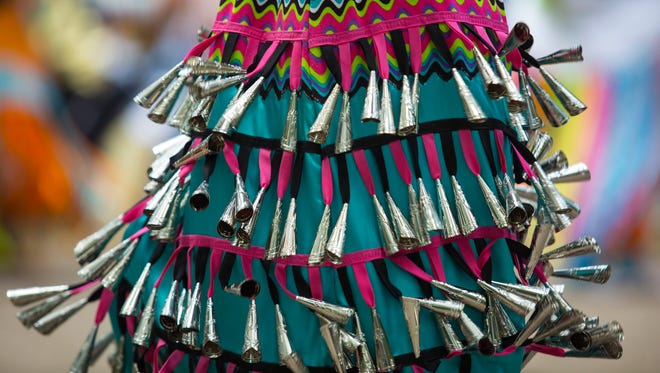 An ornate dress moves during the Sunday dance session at the 40th Nanticoke Powwow in Millsbooro.
