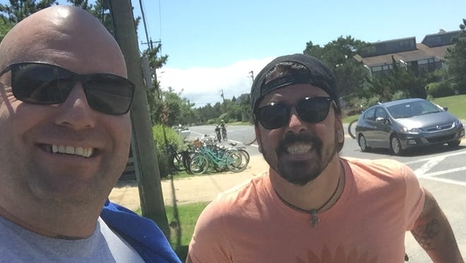 Jimi Kellogg with Dave Grohl in North Shores near Rehoboth Beach in 2016.