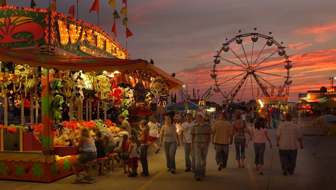 2006: The sun goes down and the fair midway lights up. See more vintage images of the Delaware State Fair.