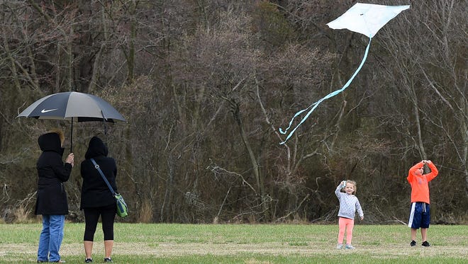 Despite cloudy and rainy weather, the 48th Annual Kite Festival was held on Friday March 25th at Cape Henlopen State Park near Lewes with a good crowd on hand flying all kinds of kites and creations.