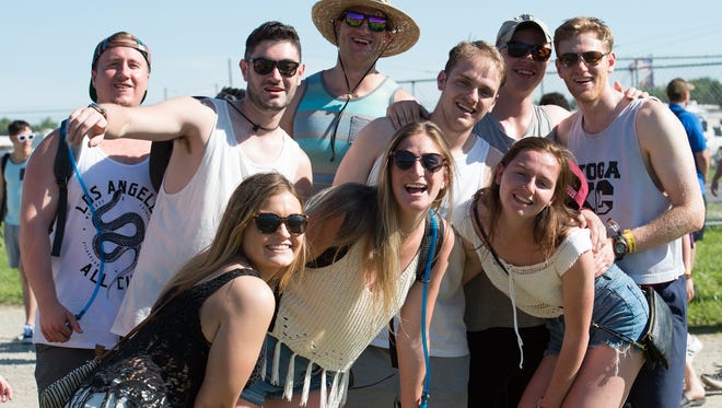A group poses for a photo at the Firefly Music Festival in Dover.