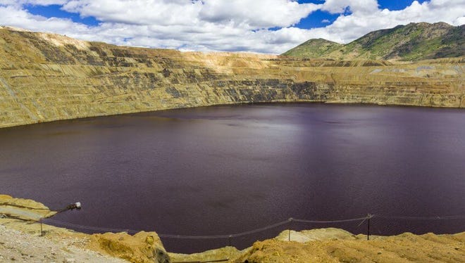 Montana: The Berkeley Pit, Butte: Once a copper mine, the Berkeley Pit is now a 7,000 feet long, 5,600 feet wide, 1,600 feet deep pit where you can see toxic waste. The pit is filled with chemicals like copper, iron, arsenic, cadmium, zinc and sulfuric acid giving it a dark coloring.

But if you think this pit is just toxic, it’s actually so saturated with copper that copper is mined directly from the water.

And it doesn’t hurt that this is a cheap sight to see — the Berkeley Viewing Stand is open from March to November and costs $2.