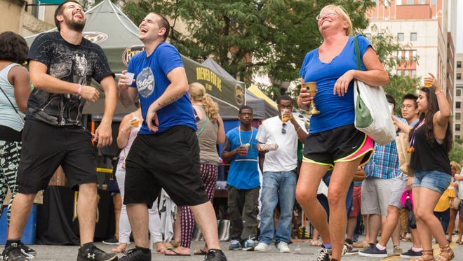 Downtown Brewfest attendees have fun at last year's debut event.