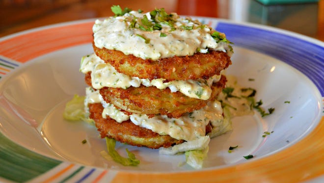 Fried green tomatoes, served with creamy crab remoulade, at The Big Easy on 60.