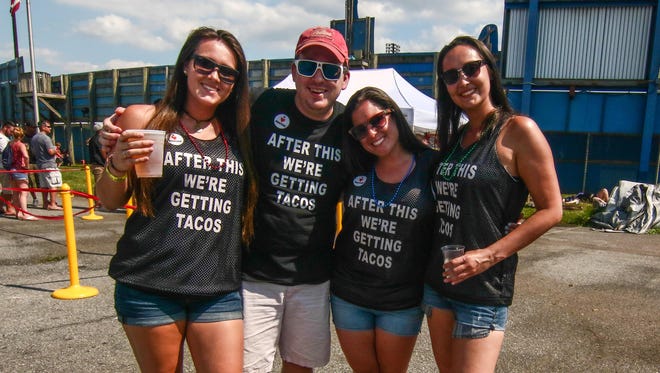 This group came prepared with matching shirts. At the Delaware Taco Festival are (from left) Shannan O' Connor of New York, Jonathan and Amanda Schiff of Wilmington, and Molly O' Connor of New York.
