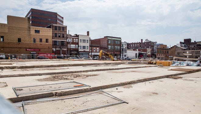 An empty lot where a parking garage once stood at the corner of Ninth and Orange Streets in Wilmington will be the home of luxury apartments.