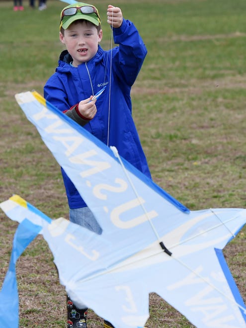 Cooper Lawson, 7 from Harbeson works to get his kite into the air, Despite cloudy and rainy weather, the 48th Annual Kite Festival was held on Friday March 25th at Cape Henlopen State Park near Lewes with a good crowd on hand flying all kinds of kites and creations.