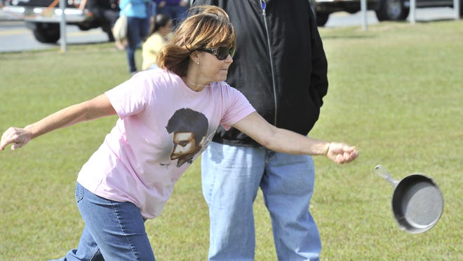 Beverly Wescott, of Newark, competes in the ladies skillet toss at the Bridgeville Apple Scrapple Festival.