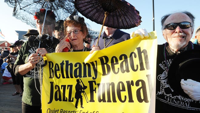 'Mourners' gathered to send off the summer of 2017 at the annual Bethany Beach Jazz Funeral on the boardwalk in Bethany Beach on Labor Day, Monday.