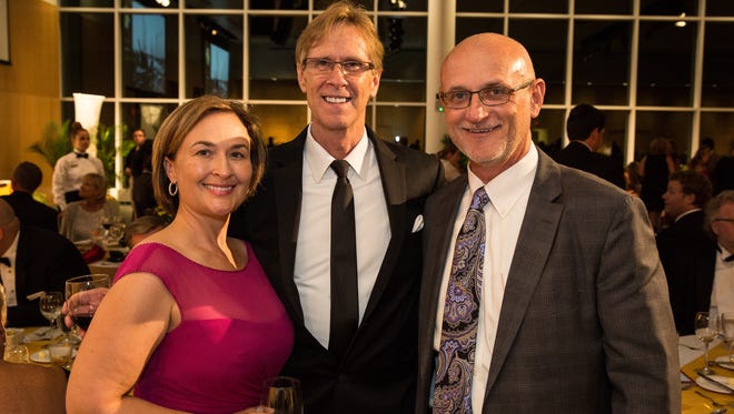 From left, Karen and Mike Dunn and Perdue Farms CEO Randy Day at the Sensational Sesquicentennial gala at Salisbury University on Saturday, Sept. 16, 2017.