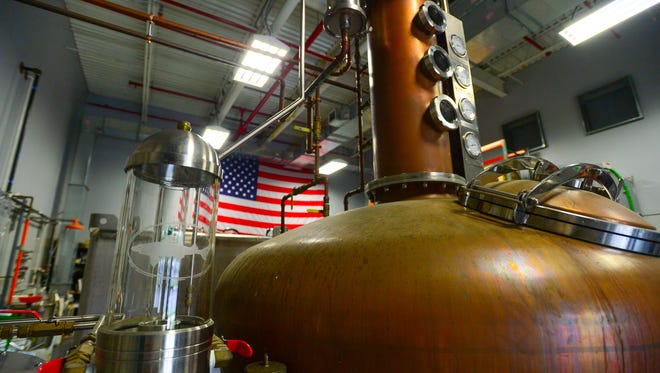 One of Dogfish Head's brass stills inside the Dogfish Head Distillery located in Milton, Del. on Friday, July 14, 2017.