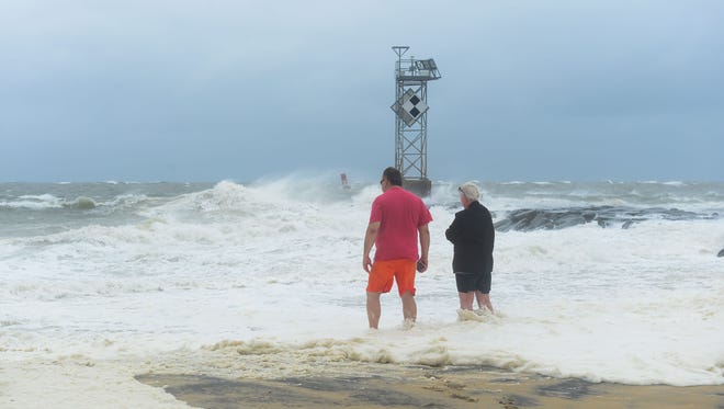 People have come out to see the effects of the summer nor'easter passing through Ocean City, Md. on Saturday, July 29, 2017 causing high winds, large waves and beach erosion.