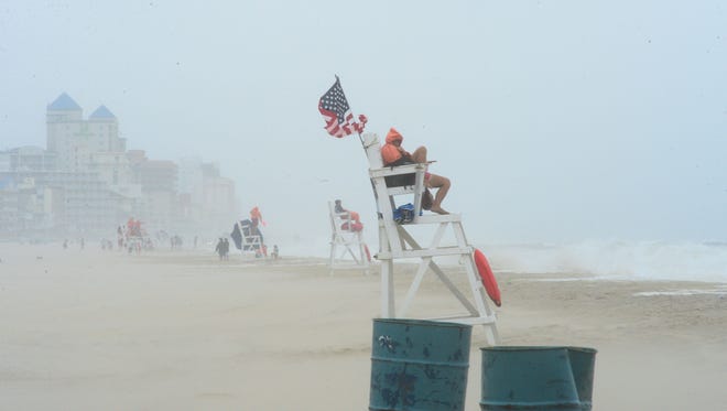 A Ocean City Beach Patrol Lifeguard endures the high winds of the summer nor'easter as they patrol the water to keep everyone safe. Saturday, July 29, 2017.