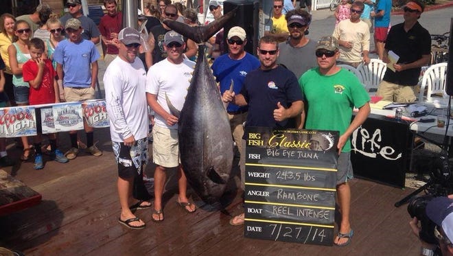 Anglers from Reel Intense hold up a prize-winning tuna from last year's Big Fish Classic.