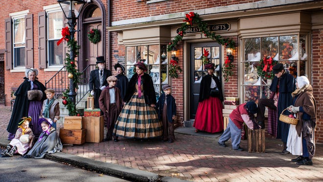 Follow the cast of " A Christmas Carol " around Old New Castle when they perform outside at the " Spirit of Christmas " festival.