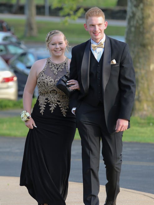 Attendees arrive at the William Penn High School prom at DuPont Country Club, Friday, May 11, 2018.