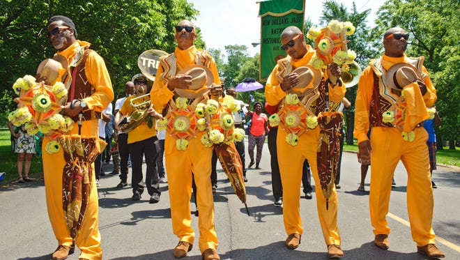 CHICAGO, IL - JUNE 11:  The Treme Brass Band performs at the National Park Service Centennial Event at Washington Park on June 11, 2016 in Chicago, Illinois.  (Photo by Timothy Hiatt/Getty Images for the National Park Foundation)