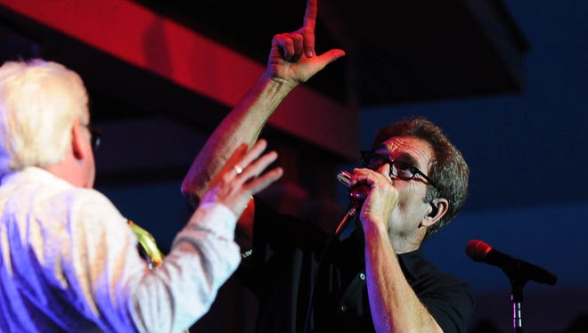 Johnny Colla and Huey Lewis of Huey Lewis and the News performed on Wednesday at the Freeman Stage.
