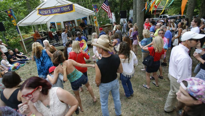 Jam band Montana Wildaxe gets the crowd dancing in the Shady Grove during the 109th Arden Fair last year.
